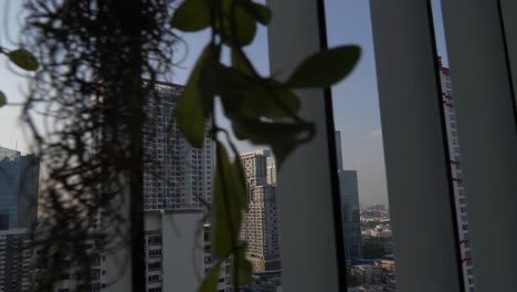 bangkok skyscraper reflects sun, blue sky