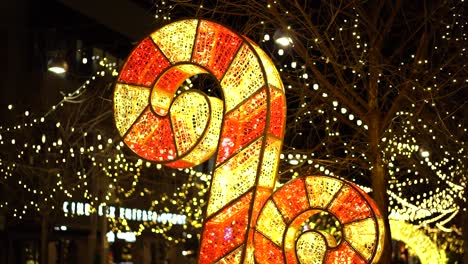 giant ornamental led christmas "candy cane" at landsdowne park, in ottawa, canada in slow motion