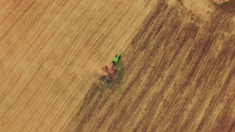 aerial view of a tractor plowing a field