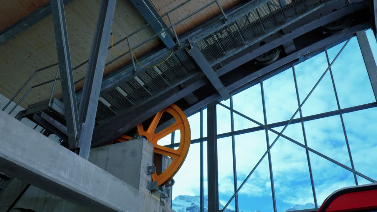 Modern hydraulic power system for the cable systems of ski lifts, chair lifts, and cable cars going up the snowy mountain slopes of Engelberg, in Brunni, Switzerland