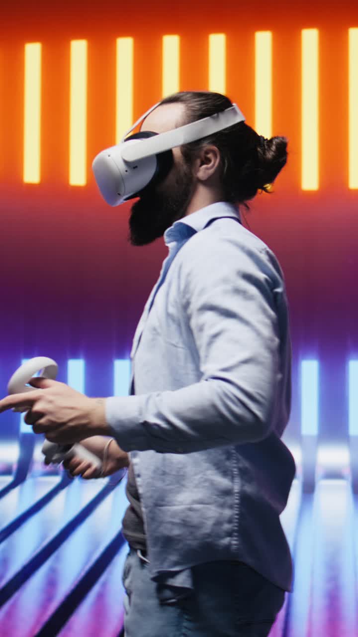 Vertical Video Stylish young man reflects artistic vibes by using virtual reality headset