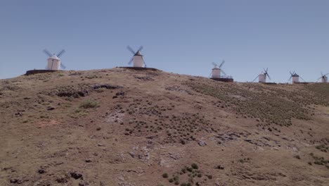 spanish windmills on the mountaintop of la mancha. aerial view of a group of typical spanish windmills. don quixote. consuegra. spain