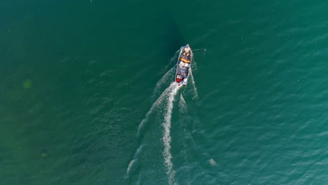 tourists fishing on a boat in river 4k