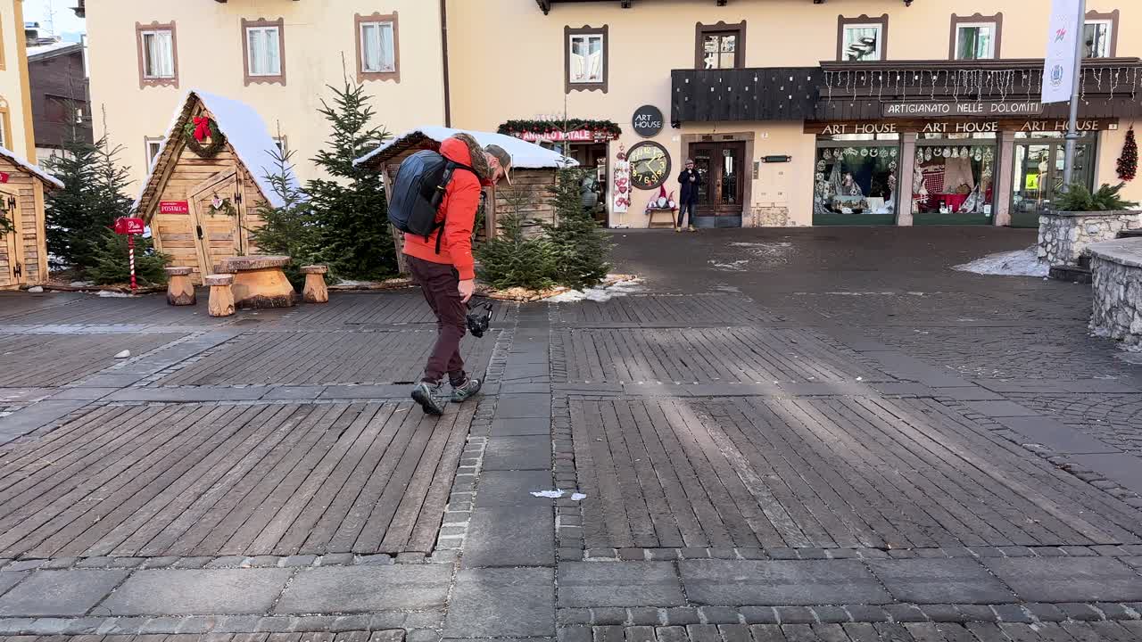 Freelance Content Creator Using Gimbal And Ninja Walk To Film Ground In Cortina d'Ampezzo