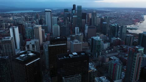 Aerial-view-tilting-up-from-the-Amazon-Spheres-to-the-Seattle-skyline-with-clouds-in-the-backdrop