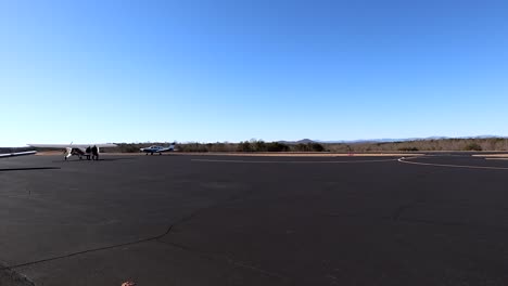 tarmac at pickens county airport with private aircraft