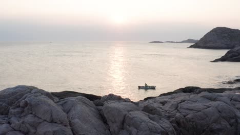 Fisherman-in-a-small-boat