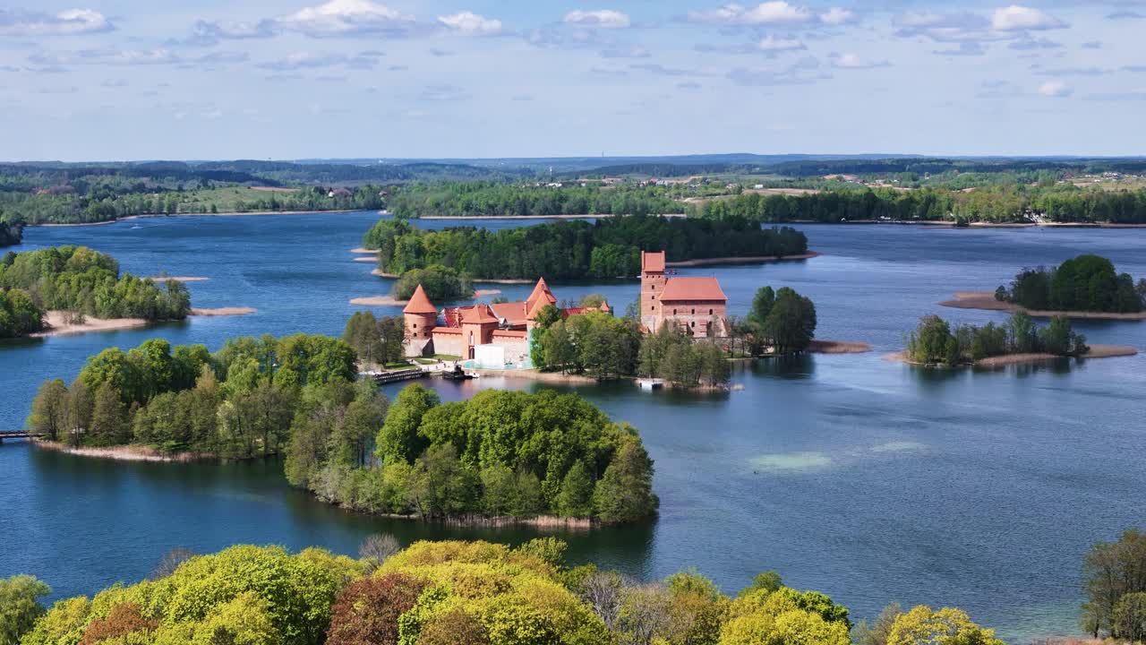 Red brick castle of Trakai in Lithuania, aerial drone view