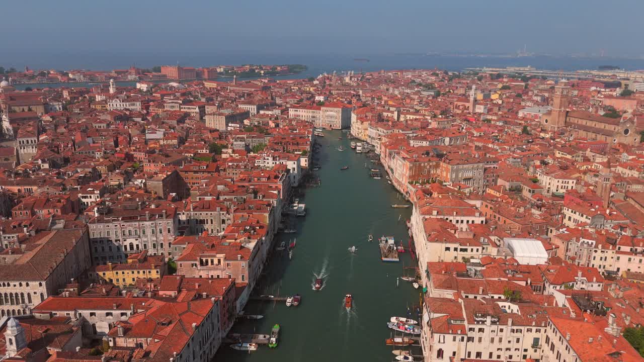 Experience the timeless beauty of Venice at dusk, as the city’s lights reflect on the tranquil waters.