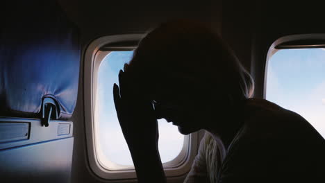 Woman-Experiences-Anxiety-In-Flight