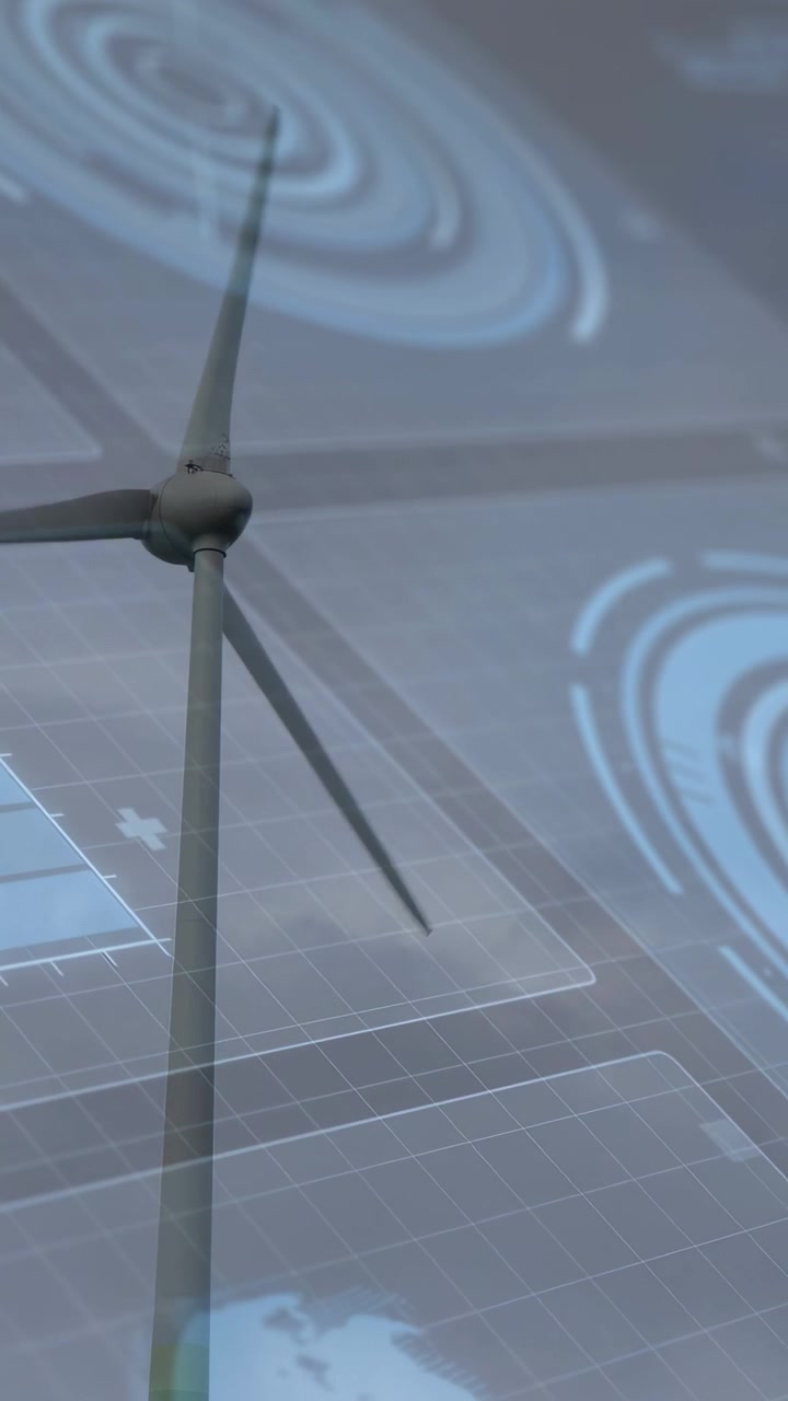 Vertical video: Moderate wind starting turbine blades rotating for energy, overlay showing grid map