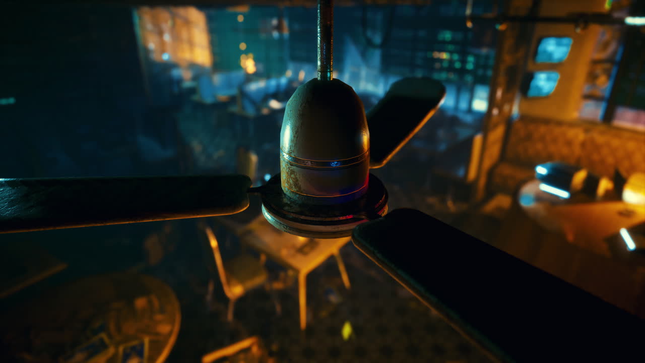 Unique perspective of a ceiling fan in a dimly lit cafe setting at night