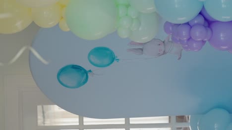 baby shower decoration with pastel ballons