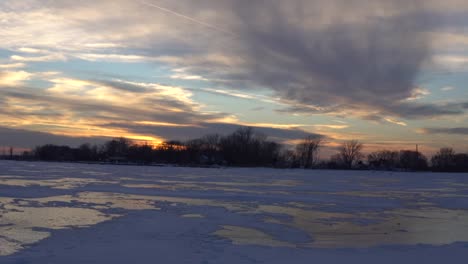 frozen oconto river sun rise