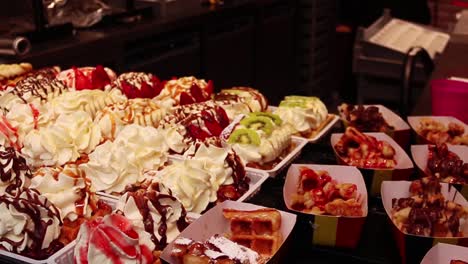 close up panning shot of fresh belgian waffles in a brussels cafe