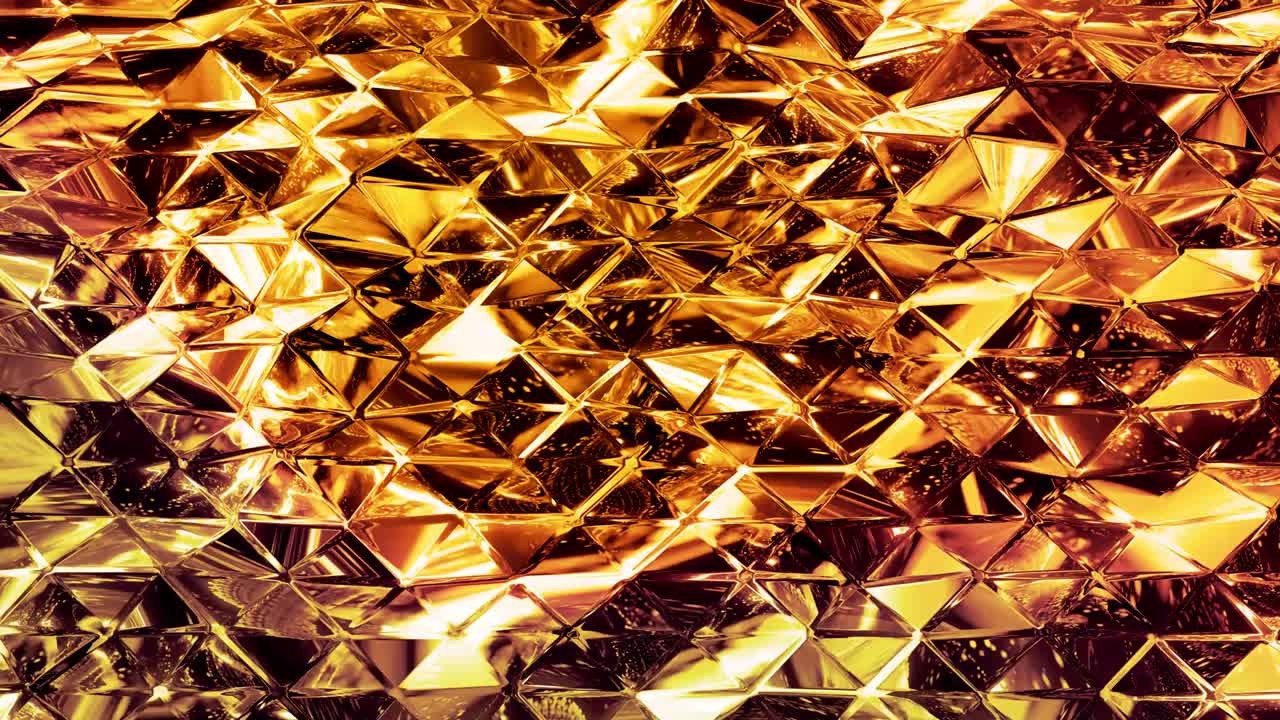 fondo abstracto en bucle con patrón líquido dorado brillante y ondulado en una superficie brillante y brillante. fluido amarillo viscoso como la superficie de papel dorado o vidrio brillante. hermoso telón de fondo festivo creativo.