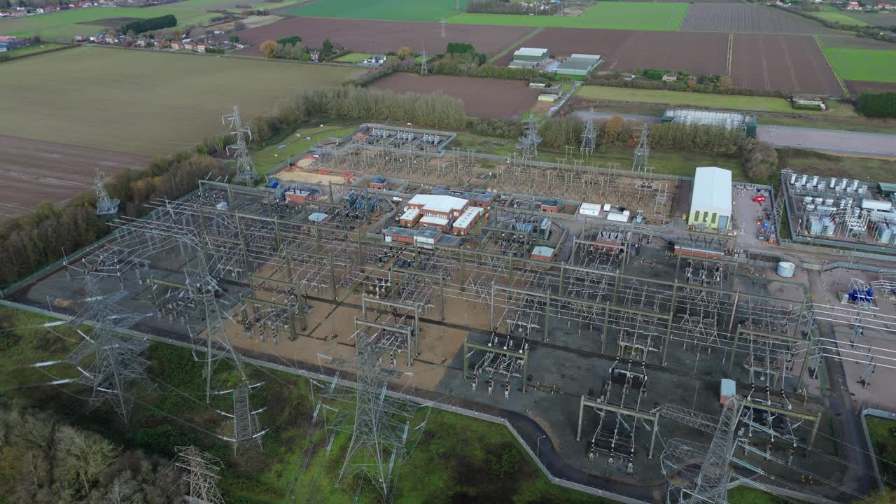 Aerial drone view of the massive Walpole Substation in Norfolk, UK, a critical node for the National Grid’s transmission and stability network