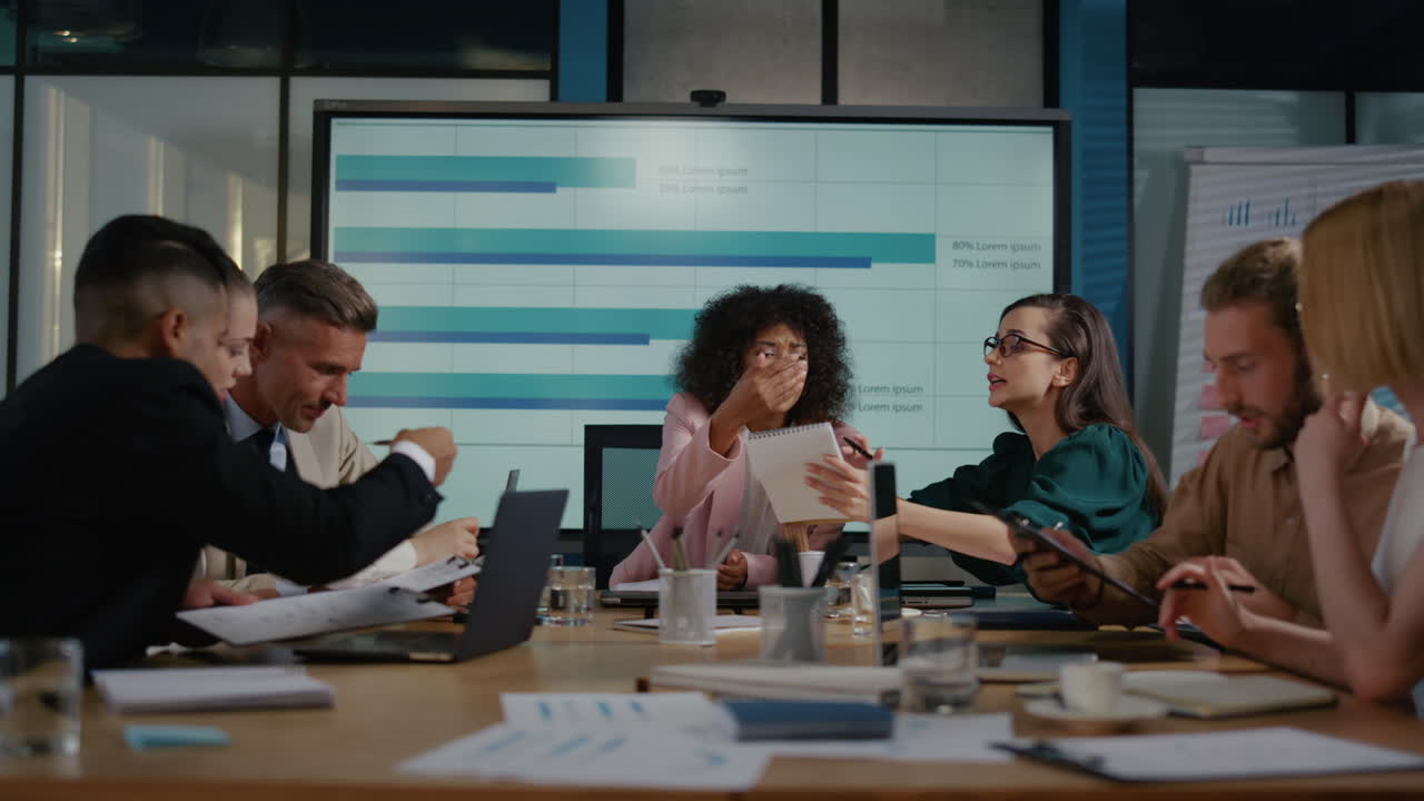 Angry top manager reading financial reports