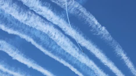 airplane creating intricate patterns in the sky