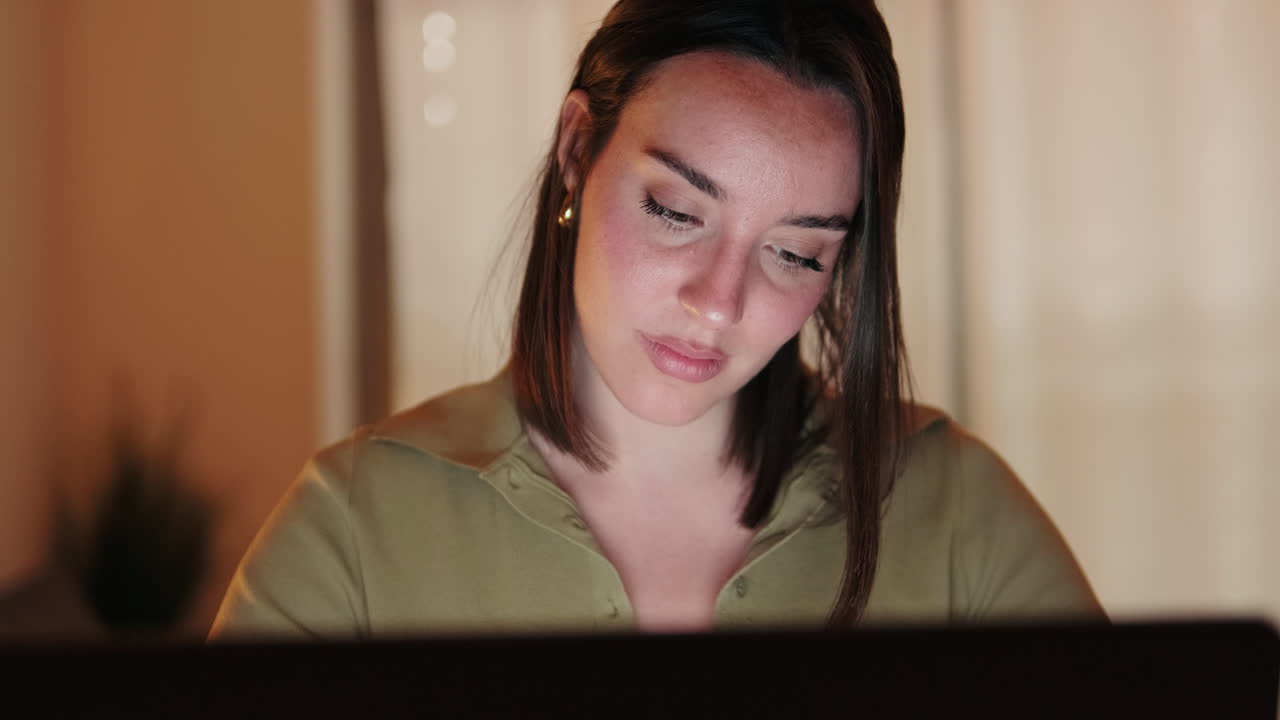 Close up of the Woman Working From Home at Night on Laptop