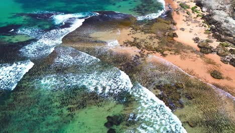 aerial-view-of-tropical-beach,-blue-waves,-4k