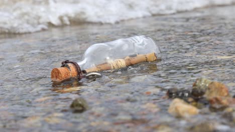 message in the bottle on the shores of the sea.