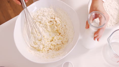 Woman-preparing-a-dough