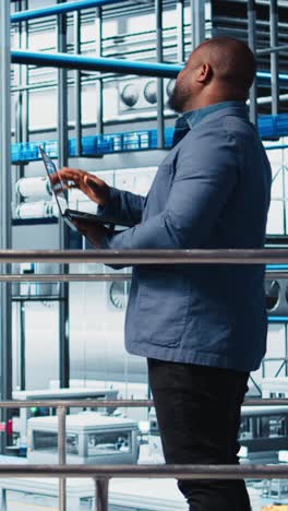 vertical video photovoltaics smart factory investor analyzing data and talking with engineers