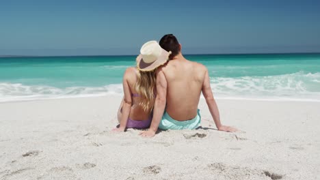 couple in love enjoying free time on the beach together