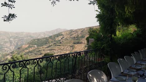 set table for wedding dinner, surrounded by the mountains of alpujarras, spain