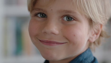 portrait happy little boy smiling with natural childhood curiosity looking joyful child with innocent playful expression 4k footage