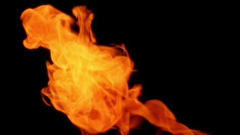 Flames-of-fire-twisting-and-twirling-looping-animation-on-black-background