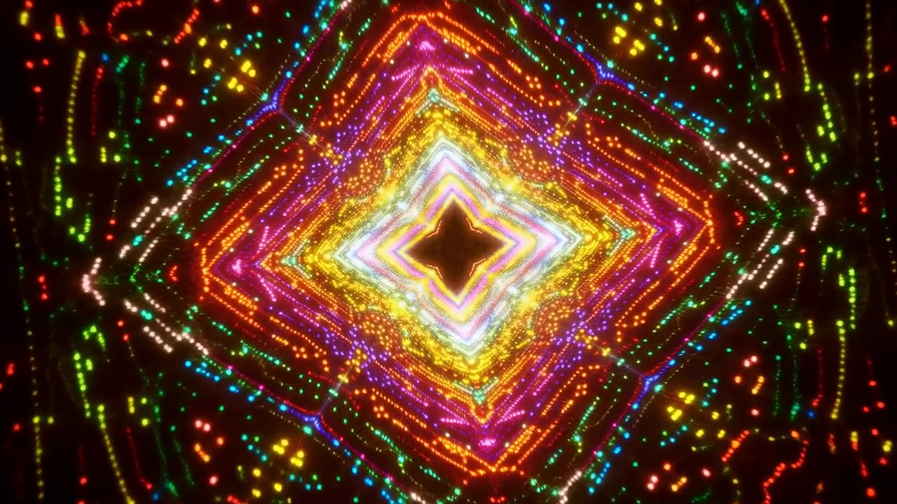 Contorni geometrici luminosi e percorsi di luce punteggiati si alternano attraverso tonalità rosse, gialle, verdi, blu, rosa e bianche mentre il motivo centrale ruota e si espande su un campo scuro