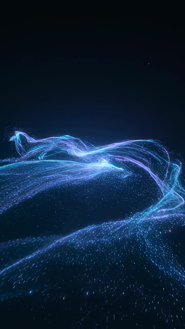 Vertical video: Flowing ribbon emerging from lower unfurling across deep void forming core sparks
