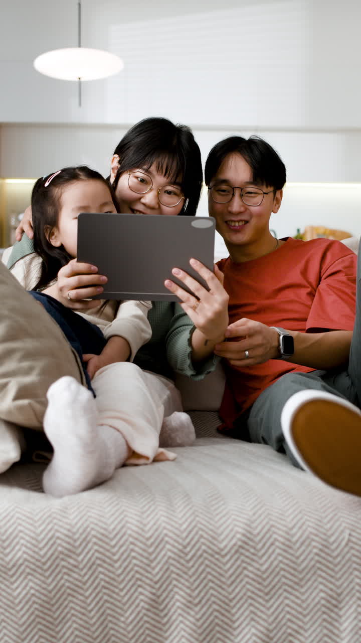Family using a tablet together