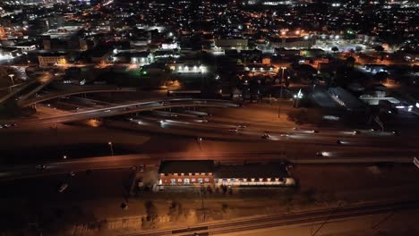 freeway in el paso, texas at night with traffic moving and stable drone video