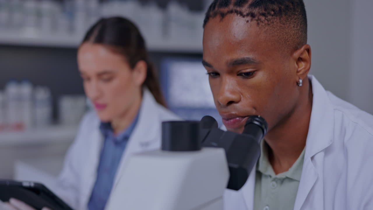 Black man, microscope analysis