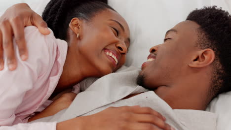 Relax-black-couple-in-love-in-home-bedroom