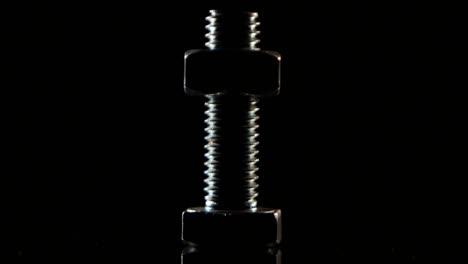 bolt and nuts on dark background