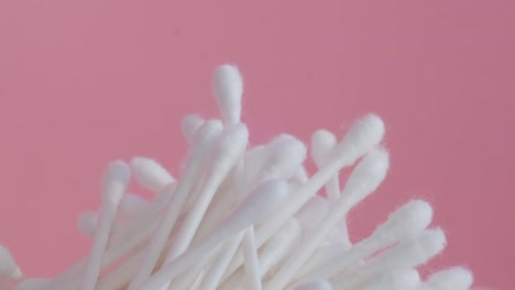 Cotton Swabs with Flowers Blossoming Petals on Pink Background a Beautiful Pink Background Adorned with a Cluster of Cotton Swabs Resembling Blossoming Flowers