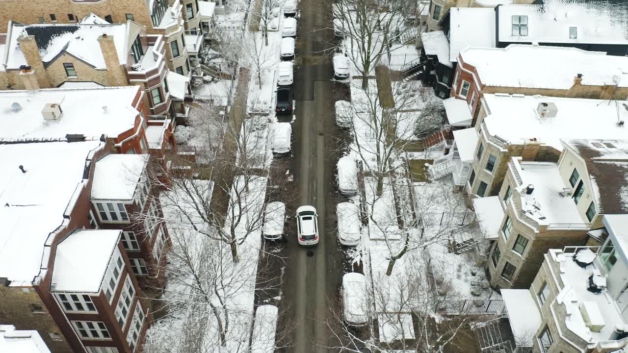 Aerial, Unrecognizable People getting into car during winter