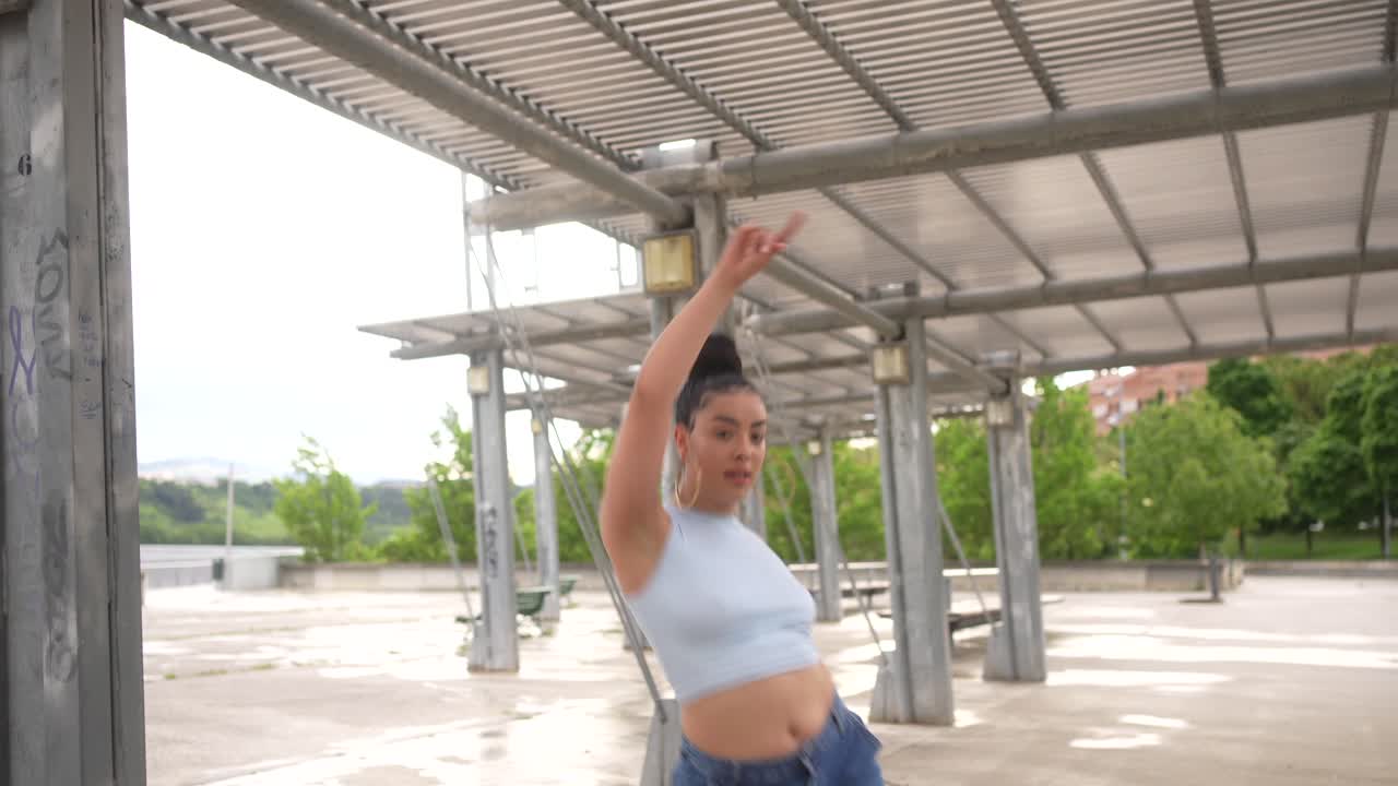 Woman dancing in an urban setting