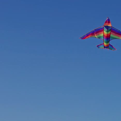 kite flying against blue sky