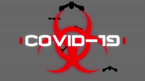 animación del texto de advertencia covid19, sobre el símbolo de peligro biológico rojo y los murciélagos, en gris