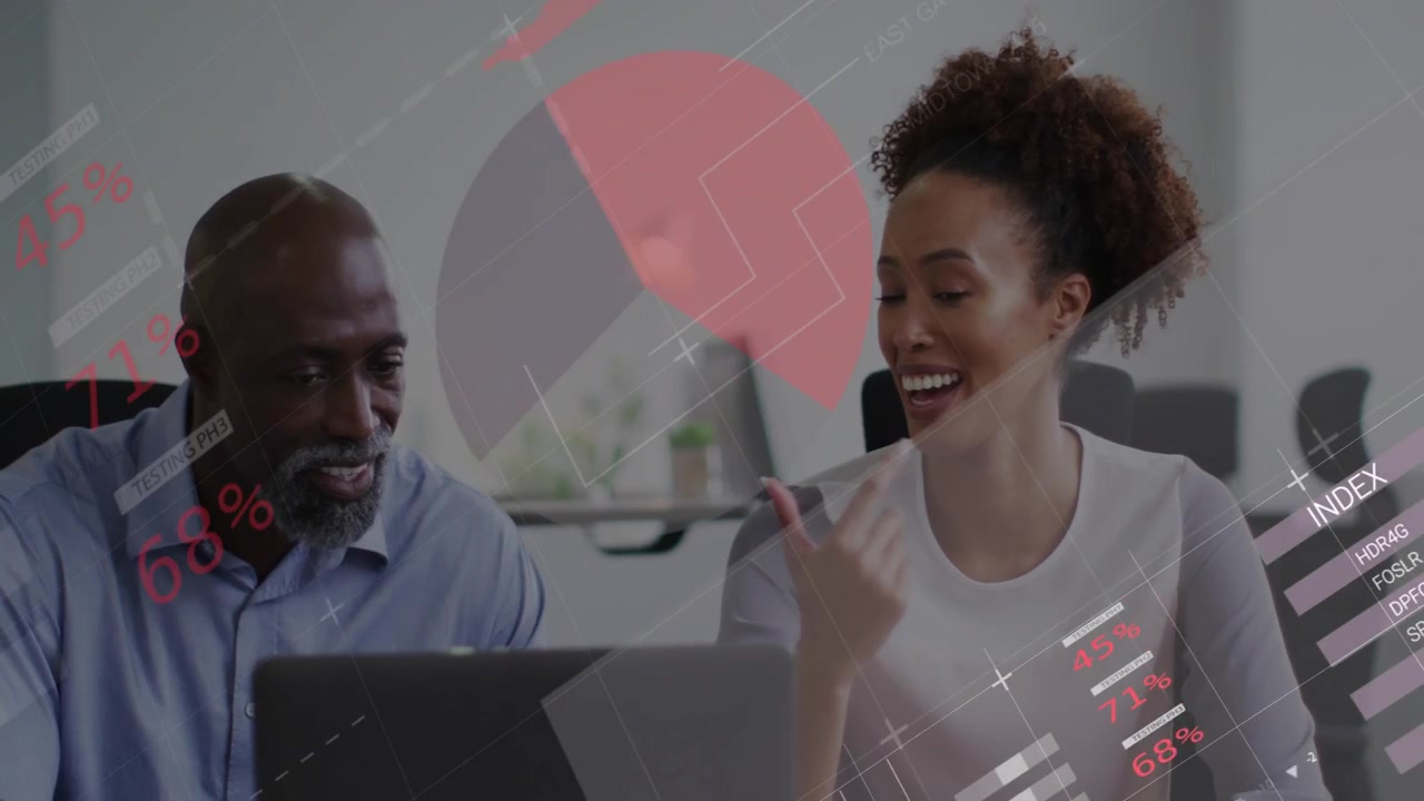 Colleagues tapping laptop and initiating data charts overlaying faces analyzing business metrics