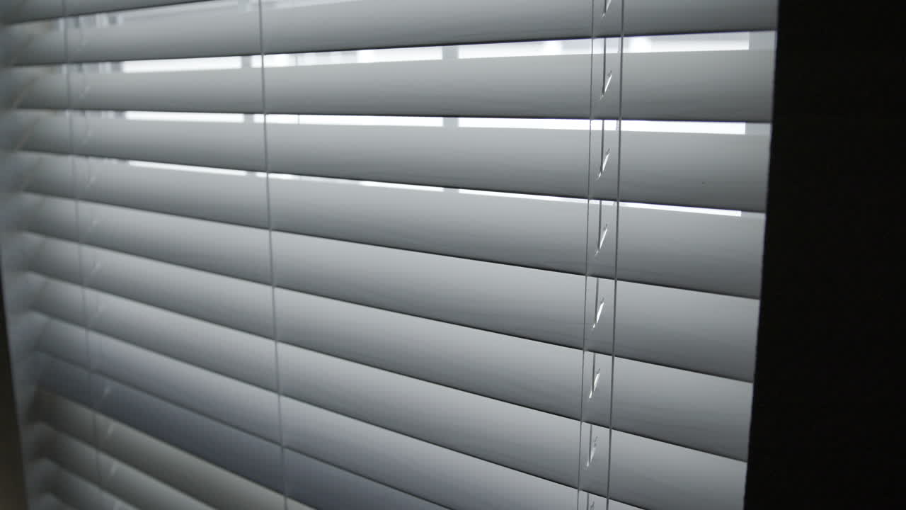 Blinds Open then Close in Slow Motion Medium Shot