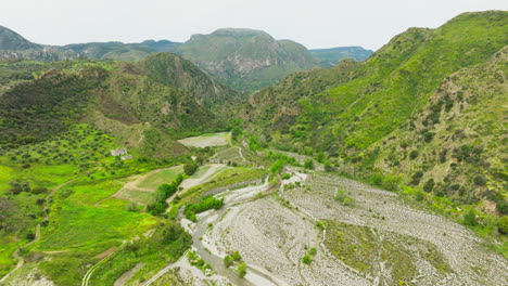 drought dry river in italy between mountains in hot summer