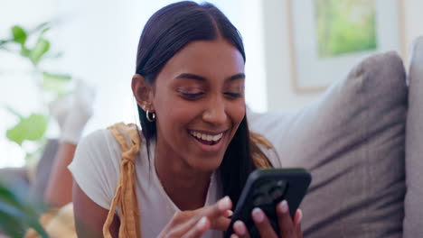 Woman,-couch-and-relax-with-phone-for-funny