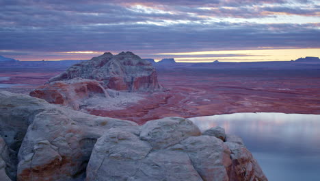 the drone gracefully circles the towering sandstone formations of glen canyon, showcasing its natural beauty.