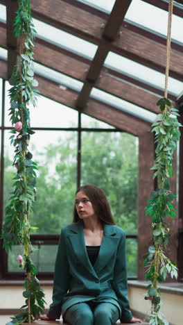 fatigued woman slumps on swings at home. businesswoman energy drained from demanding day of negotiations. woman tired because of high-pressure day